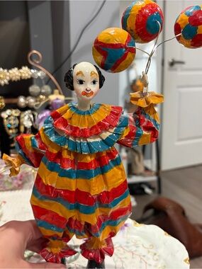 Colorful Striped Clown Figurine with Balloons